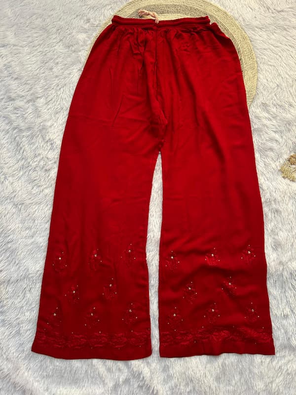 Red rayon mukesh chikankari pant by Hayat’s Lucknowi