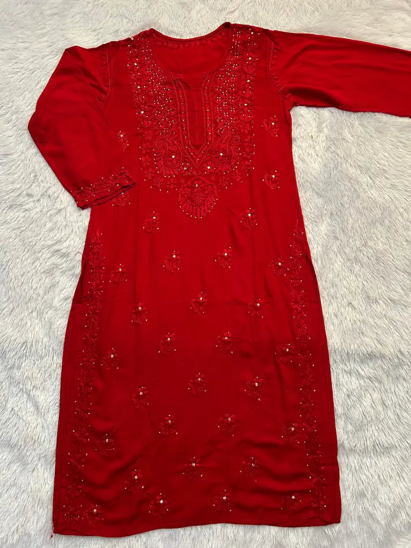 Red rayon mukesh chikankari top by Hayat’s Lucknowi