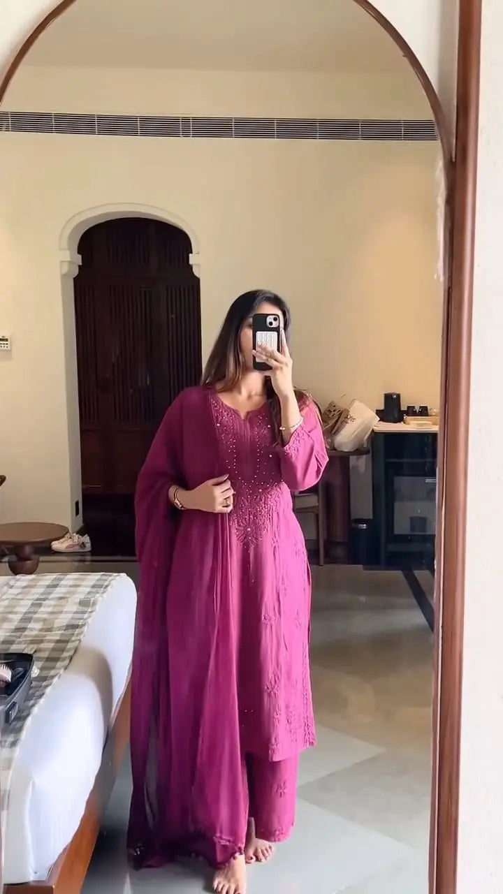 
Wine rayon Lucknowi chikankari kurta set with mukesh work and dupatta crafted for elegant festive wear by Hayat's Lucknowi
