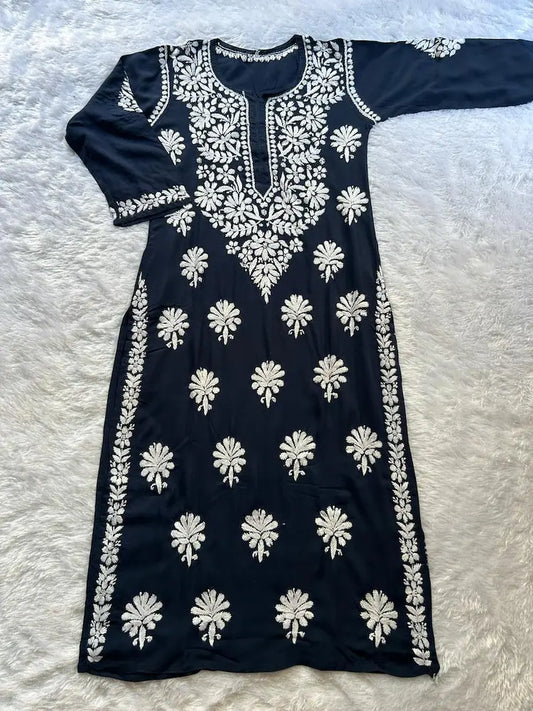 
Navy modal Lucknowi chikankari kurta crafted with intricate hand embroidery for a refined and elegant ethnic look by Hayat's Lucknowi
