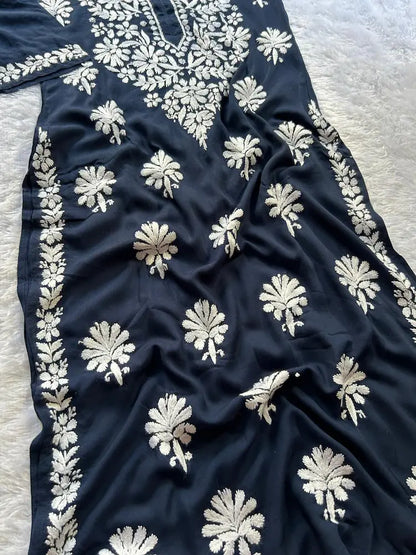 
Navy modal Lucknowi chikankari kurta crafted with intricate hand embroidery for a refined and elegant ethnic look by Hayat's Lucknowi
