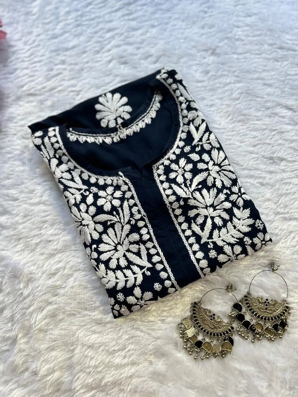 
Navy modal Lucknowi chikankari kurta crafted with intricate hand embroidery for a refined and elegant ethnic look by Hayat's Lucknowi

