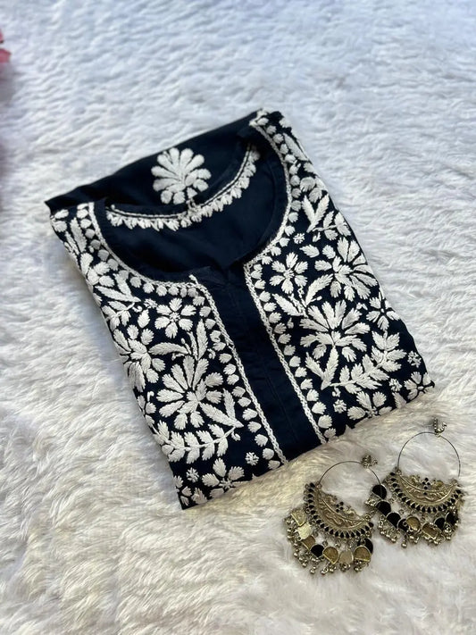 
Navy modal Lucknowi chikankari kurta crafted with intricate hand embroidery for a refined and elegant ethnic look by Hayat's Lucknowi
