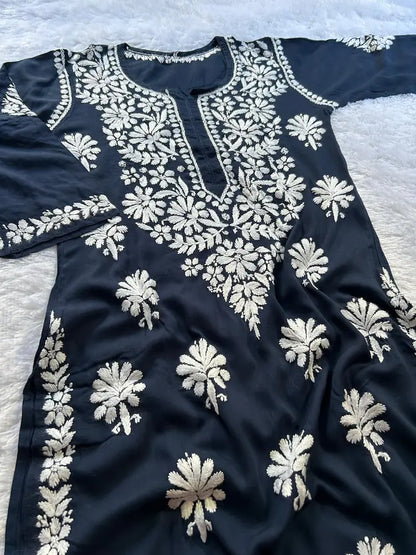 
Navy modal Lucknowi chikankari kurta crafted with intricate hand embroidery for a refined and elegant ethnic look by Hayat's Lucknowi
