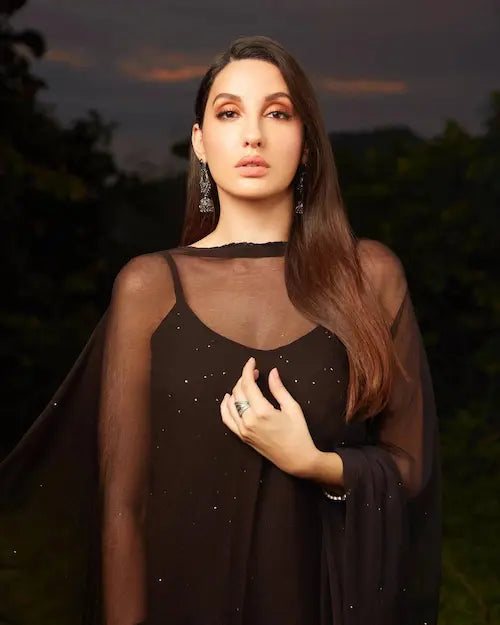 Black viscose georgette gharara set with chikankari and mukesh embroidery by Hayat’s Lucknowi