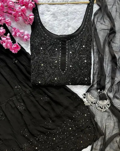 Black viscose georgette gharara set with chikankari and mukesh embroidery by Hayat’s Lucknowi
