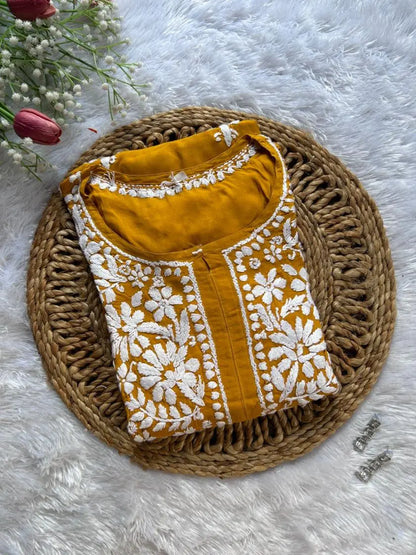 Mustard modal kurti with chikankari embroidery by Hayat’s Lucknowi