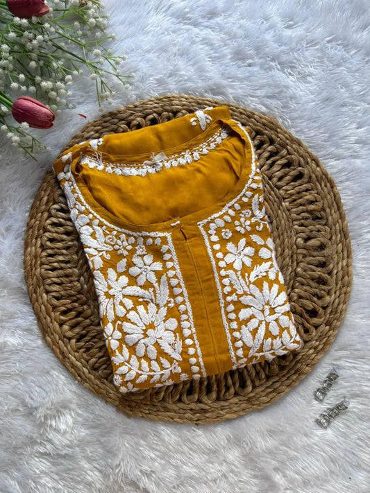 Mustard modal kurti with chikankari embroidery by Hayat’s Lucknowi