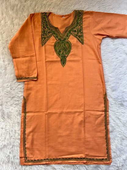 
Paisley peach Kashmiri long kurta featuring intricate traditional patterns and elegant ethnic styling by Hayat's Lucknowi