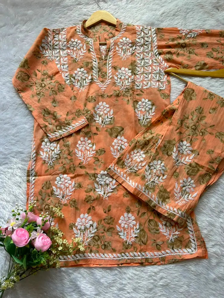 
Sana peach green mul mul Lucknowi chikankari kurta set featuring delicate hand embroidery and soft breathable fabric for elegant everyday and festive ethnic wear by Hayat's Lucknowi.
