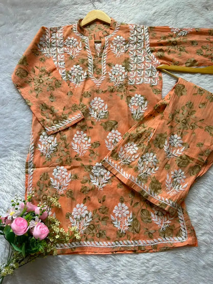 
Sana peach green mul mul Lucknowi chikankari kurta set featuring delicate hand embroidery and soft breathable fabric for elegant everyday and festive ethnic wear by Hayat's Lucknowi.
