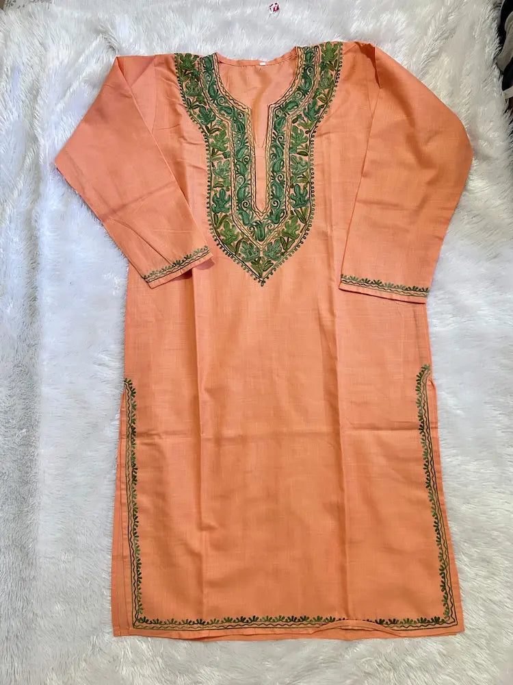 
Peach Kashmiri long kurta with chinar green embroidery showcasing traditional craftsmanship and timeless ethnic elegance by Hayat's Lucknowi