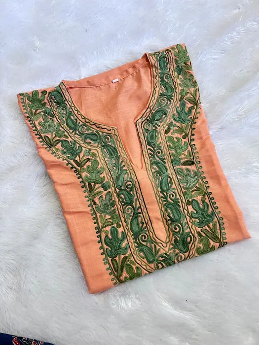 
Peach Kashmiri long kurta with chinar green embroidery showcasing traditional craftsmanship and timeless ethnic elegance by Hayat's Lucknowi