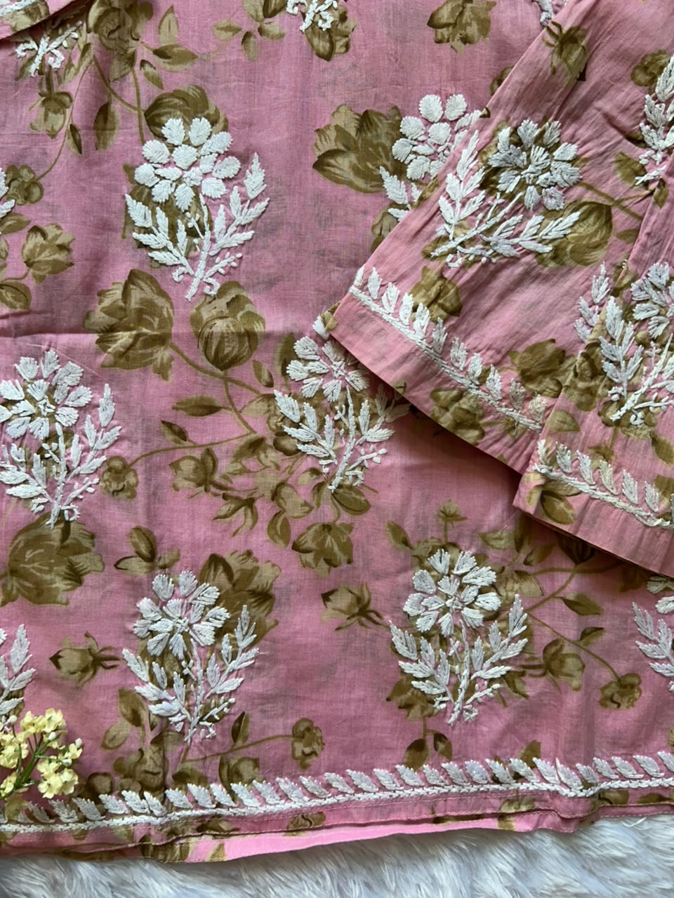 
Sana pink mul mul Lucknowi chikankari kurta set featuring delicate hand embroidery and soft breathable fabric for graceful everyday and festive ethnic wear by Hayat's Lucknowi.
