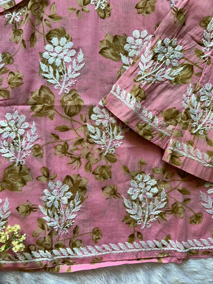 
Sana pink mul mul Lucknowi chikankari kurta set featuring delicate hand embroidery and soft breathable fabric for graceful everyday and festive ethnic wear by Hayat's Lucknowi.
