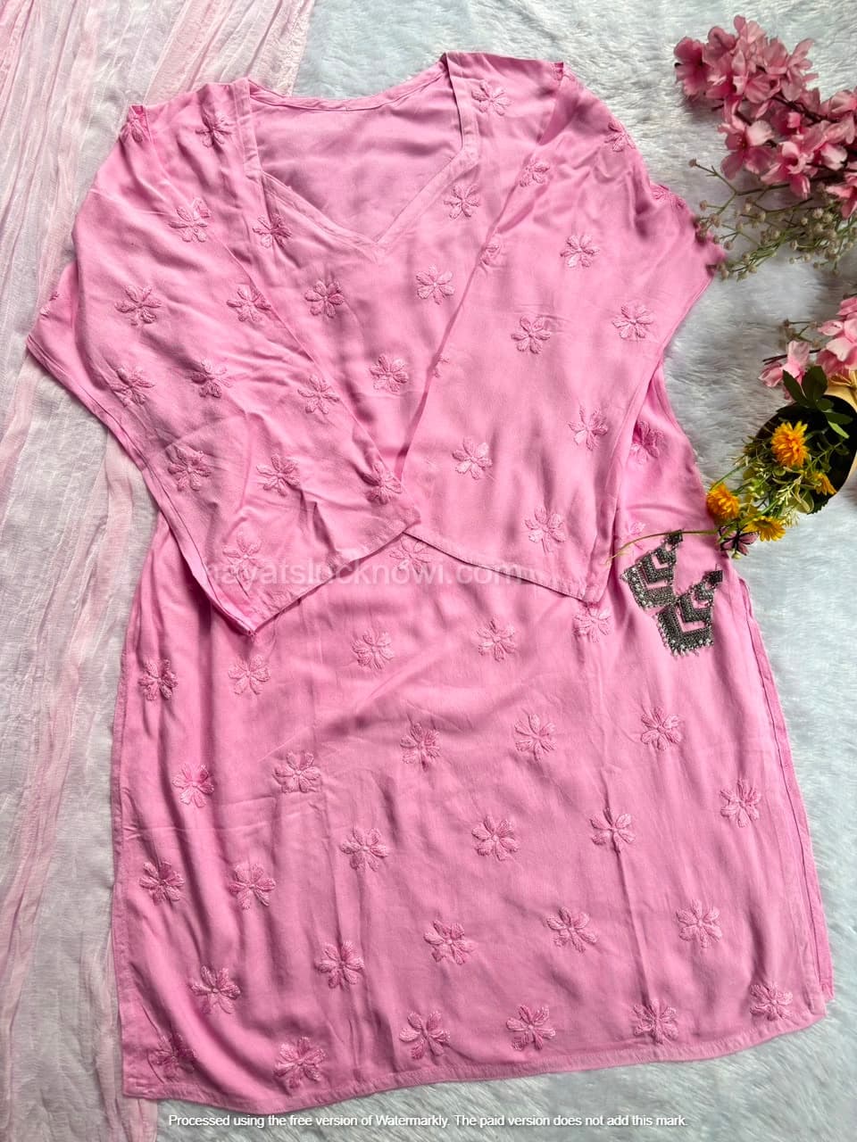 

Pink Rayon Chikankari Farshi Set featuring intricate hand embroidery on soft rayon fabric for a graceful traditional and festive look by Hayat’s Lucknowi.
