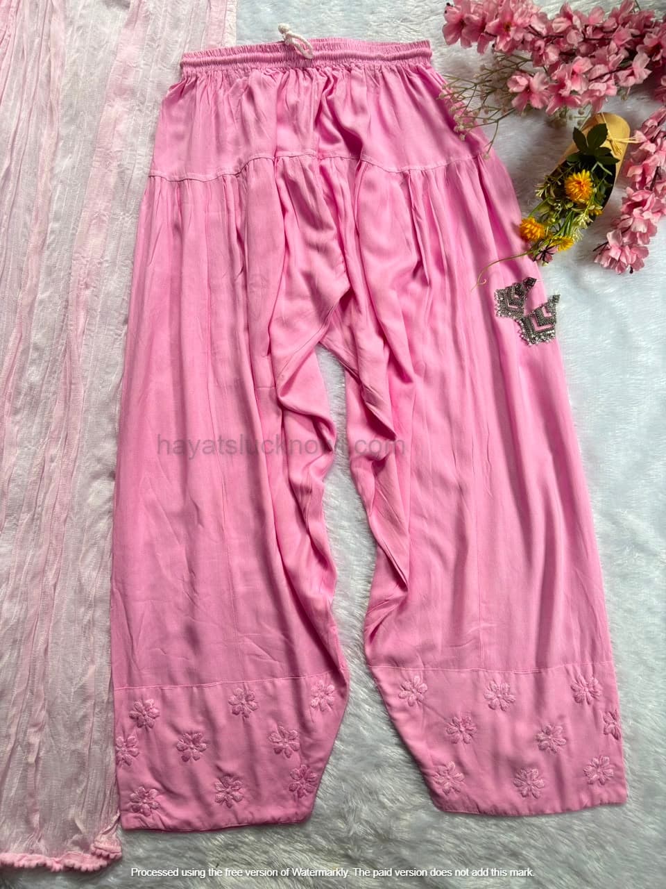 
Pink Rayon Chikankari Farshi Set featuring intricate hand embroidery on soft rayon fabric for a graceful traditional and festive look by Hayat’s Lucknowi.
