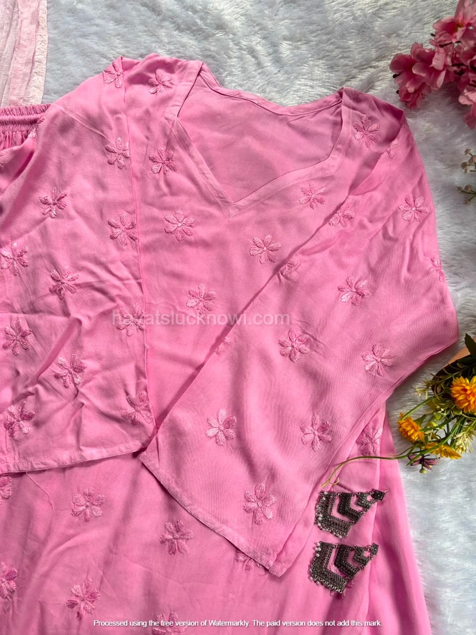 

Pink Rayon Chikankari Farshi Set featuring intricate hand embroidery on soft rayon fabric for a graceful traditional and festive look by Hayat’s Lucknowi.

