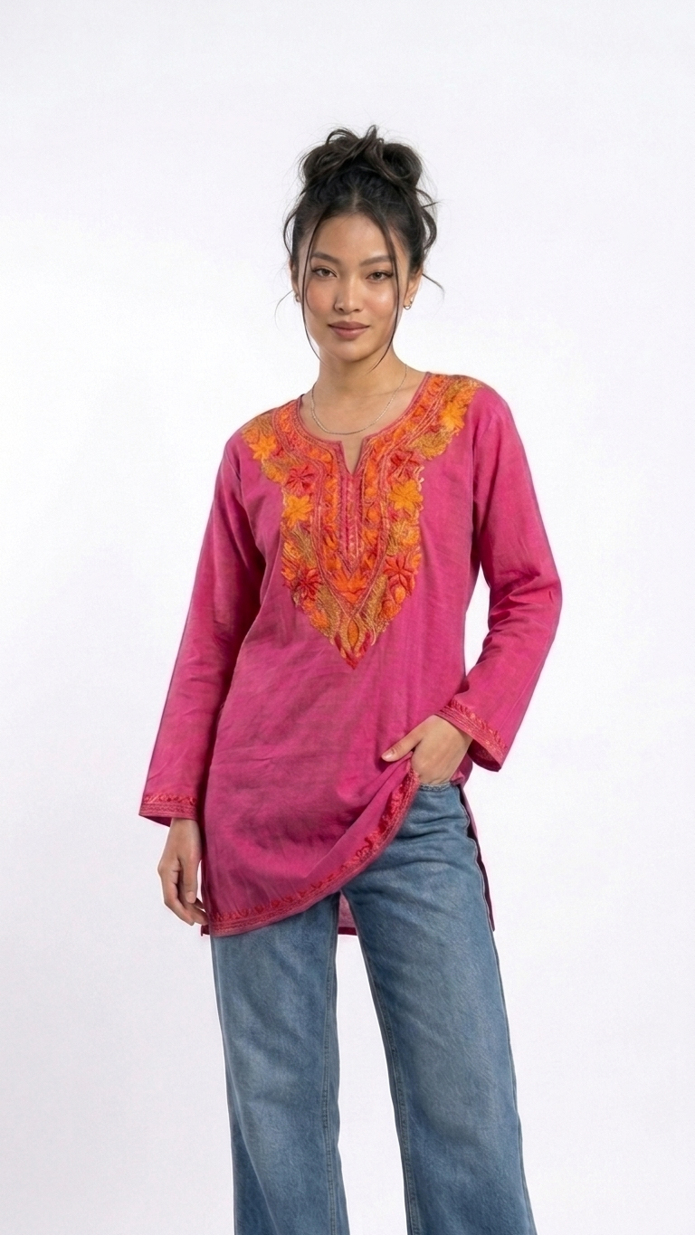 
Rani pink cotton Kashmiri short embroidered kurti featuring intricate traditional Kashmiri embroidery and soft breathable cotton fabric for stylish everyday ethnic wear by Hayat's Lucknowi.
