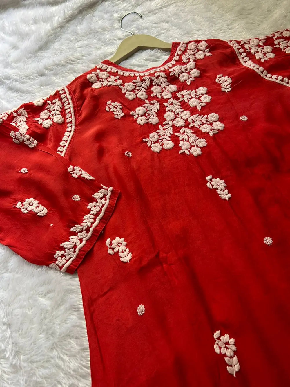 
Red muslin silk chikankari kurta showcasing timeless Lucknowi craftsmanship by Hayat's Lucknowi
