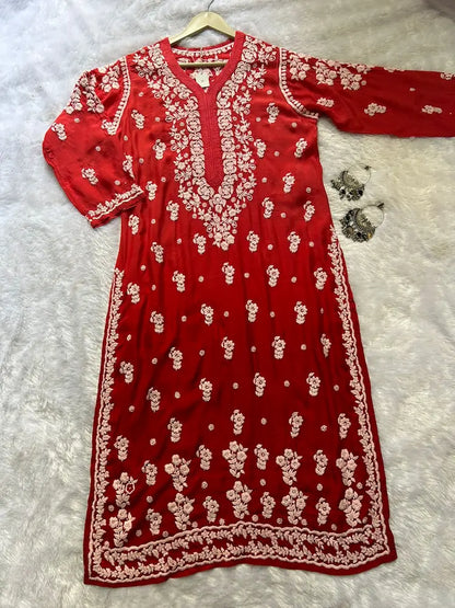 
Red muslin silk chikankari kurta showcasing timeless Lucknowi craftsmanship by Hayat's Lucknowi
