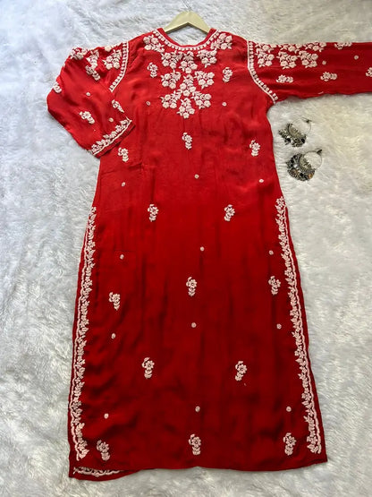 
Red muslin silk chikankari kurta showcasing timeless Lucknowi craftsmanship by Hayat's Lucknowi
