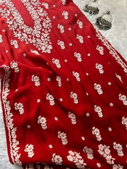 
Red muslin silk chikankari kurta showcasing timeless Lucknowi craftsmanship by Hayat's Lucknowi
