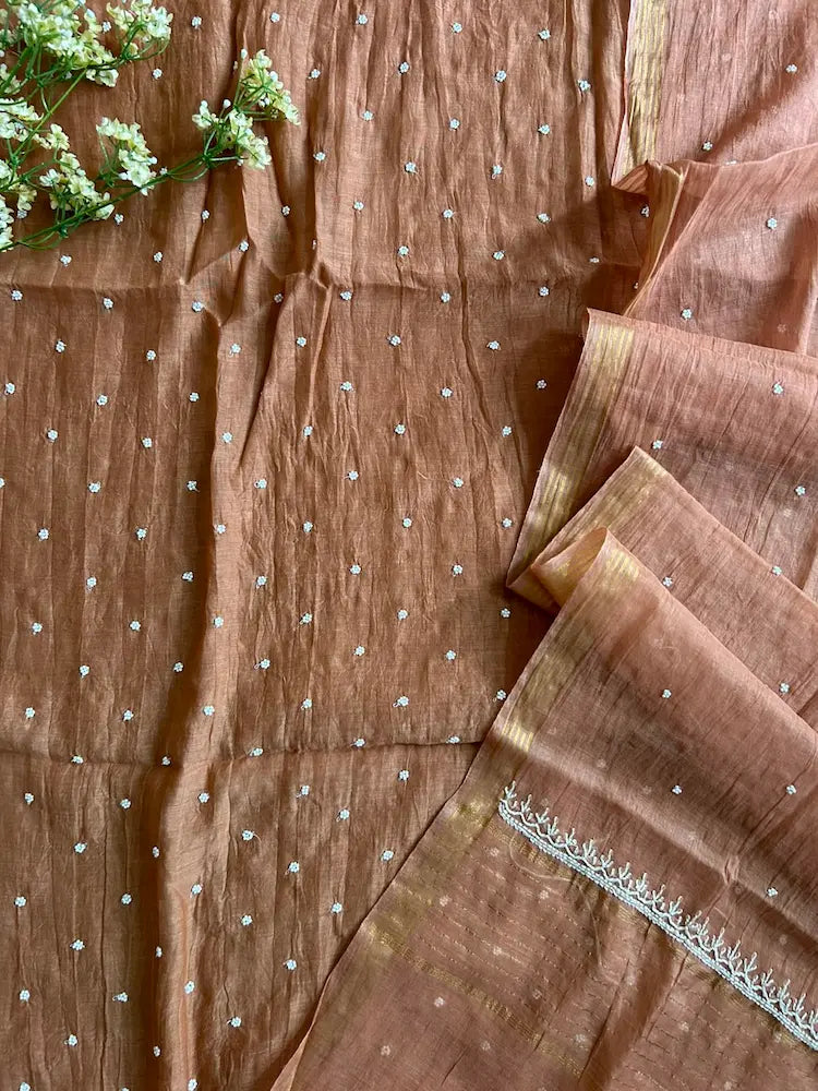 
Reshmi women's brown mul Chanderi handwork kurta and dupatta unstitched suit featuring intricate handcrafted detailing and elegant traditional craftsmanship for timeless ethnic wear by Hayat's Lucknowi.

