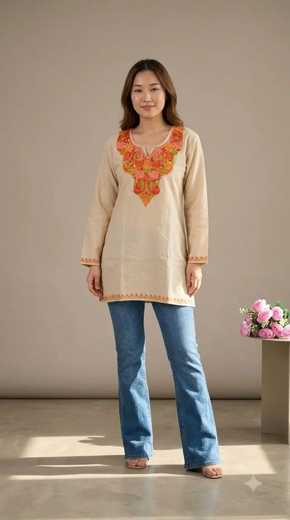Rida Ivory Cotton Kashmiri Short Embroidered Kurti featuring intricate traditional Kashmiri embroidery on soft, breathable cotton fabric for an elegant everyday ethnic look by Hayat’s Lucknowi.
