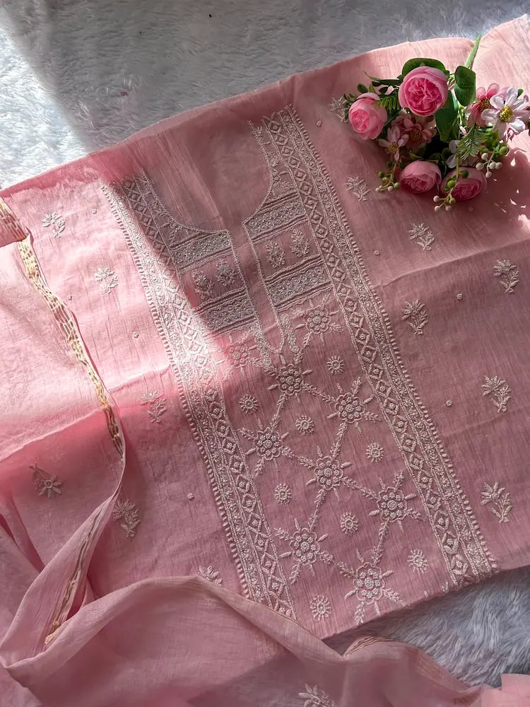 
Roohi women's pink mul Chanderi handwork kurta and dupatta unstitched suit featuring intricate handcrafted detailing and elegant traditional craftsmanship for graceful ethnic wear by Hayat's Lucknowi.
