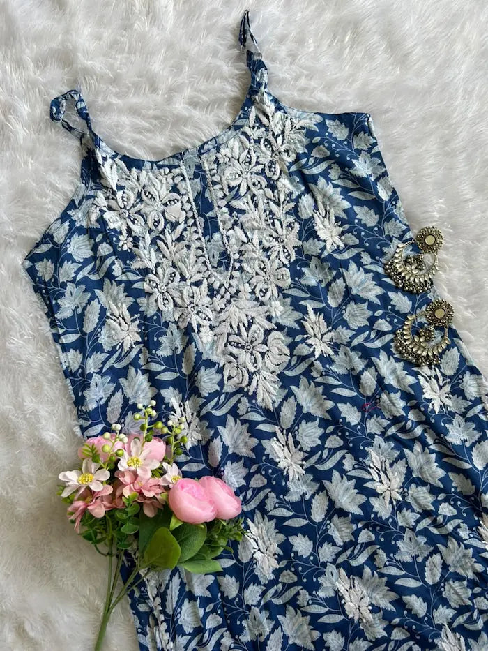 Saaz Blue Noodle Strap Mul Mul Kurta featuring delicate Chikankari embroidery on lightweight, soft and breathable Mul Mul cotton fabric for an elegant and effortless ethnic look by Hayat’s Lucknowi.
