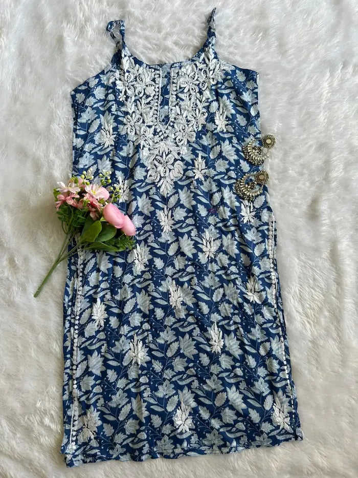 Saaz Blue Noodle Strap Mul Mul Kurta featuring delicate Chikankari embroidery on lightweight, soft and breathable Mul Mul cotton fabric for an elegant and effortless ethnic look by Hayat’s Lucknowi.
