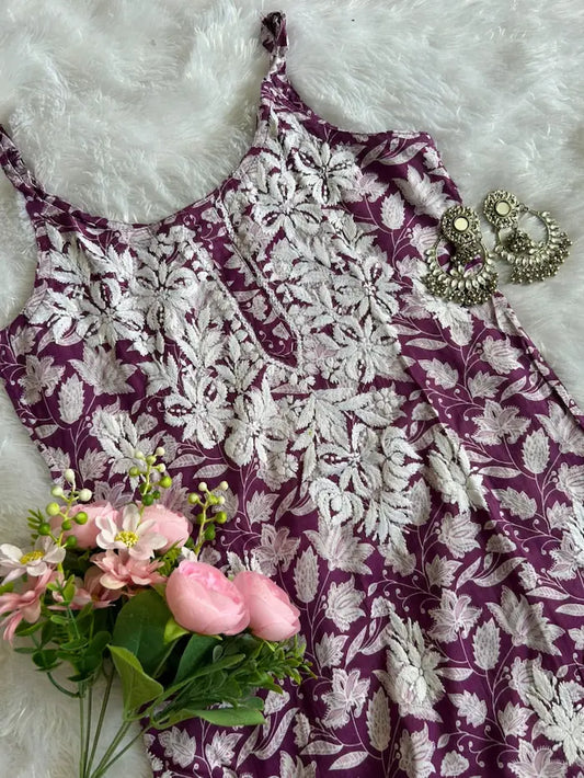Saaz Purple Noodle Strap Mul Mul Kurta featuring delicate Chikankari embroidery on lightweight, soft and breathable Mul Mul cotton fabric for an elegant and effortless ethnic look by Hayat’s Lucknowi.
