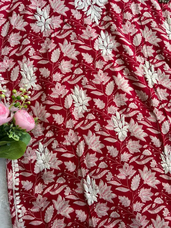 Saaz Red Noodle Strap Mul Mul Kurta featuring delicate Chikankari embroidery on lightweight, soft and breathable Mul Mul cotton fabric for an elegant and effortless ethnic look by Hayat’s Lucknowi.
