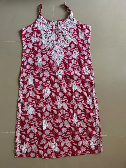 Saaz Red Noodle Strap Mul Mul Kurta featuring delicate Chikankari embroidery on lightweight, soft and breathable Mul Mul cotton fabric for an elegant and effortless ethnic look by Hayat’s Lucknowi.
