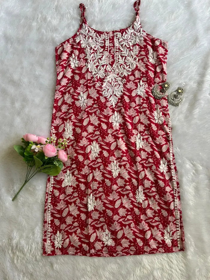 Saaz Red Noodle Strap Mul Mul Kurta featuring delicate Chikankari embroidery on lightweight, soft and breathable Mul Mul cotton fabric for an elegant and effortless ethnic look by Hayat’s Lucknowi.
