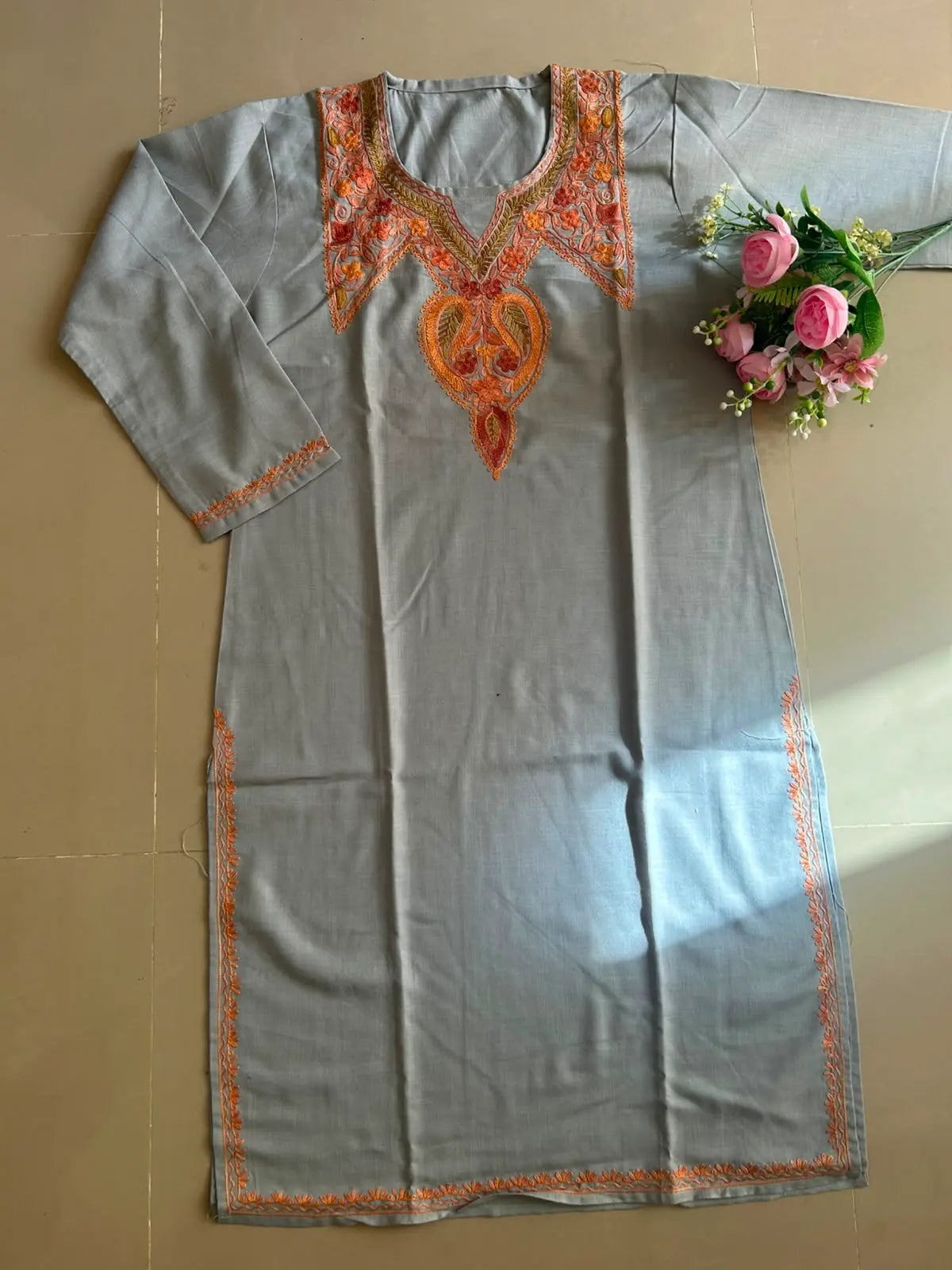 
Sabiha gray cotton Kashmiri embroidered long kurta featuring intricate traditional Kashmiri embroidery and soft breathable cotton fabric for elegant everyday ethnic wear by Hayat's Lucknowi.
