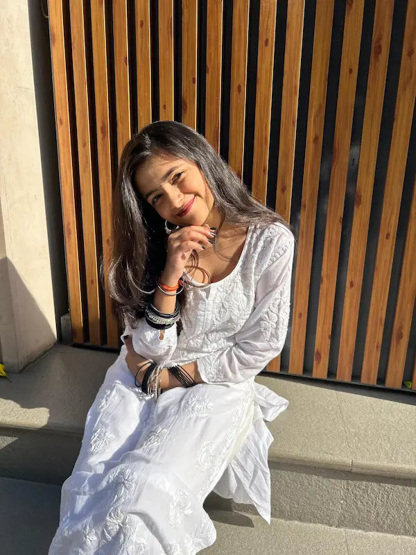 White pure modal kurti with chikankari embroidery by Hayat’s Lucknowi