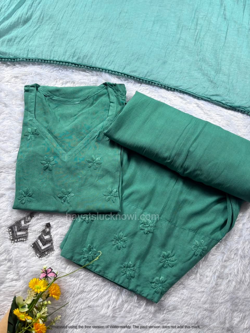 

Sage Green Rayon Chikankari Farshi Set featuring intricate hand embroidery on soft rayon fabric for a graceful traditional and festive look by Hayat’s Lucknowi.
