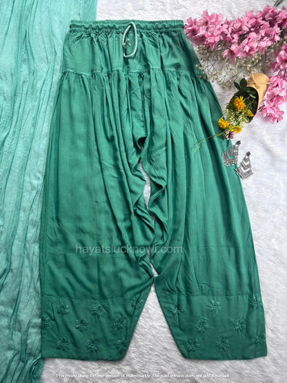 

Sage Green Rayon Chikankari Farshi Set featuring intricate hand embroidery on soft rayon fabric for a graceful traditional and festive look by Hayat’s Lucknowi.

