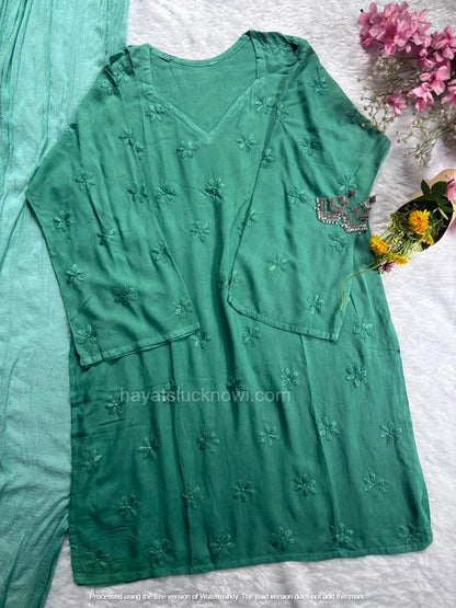 
Sage Green Rayon Chikankari Farshi Set featuring intricate hand embroidery on soft rayon fabric for a graceful traditional and festive look by Hayat’s Lucknowi.

