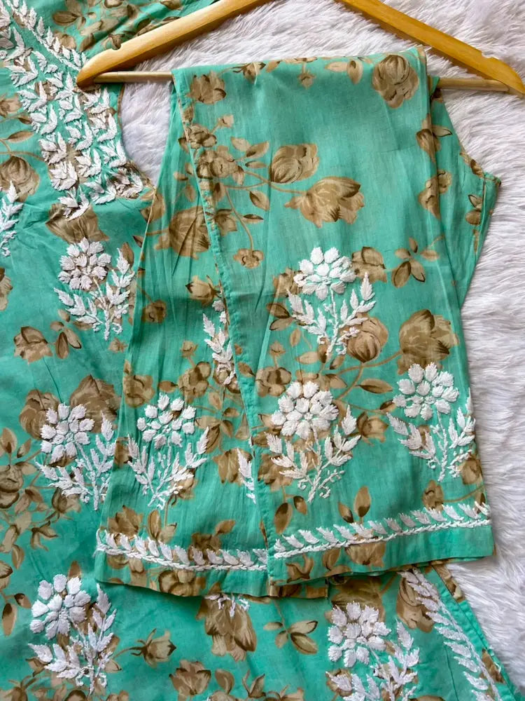 
Sana sea green mul mul Lucknowi chikankari kurta set featuring delicate hand embroidery and soft breathable fabric for fresh, elegant everyday and festive ethnic wear by Hayat's Lucknowi.
