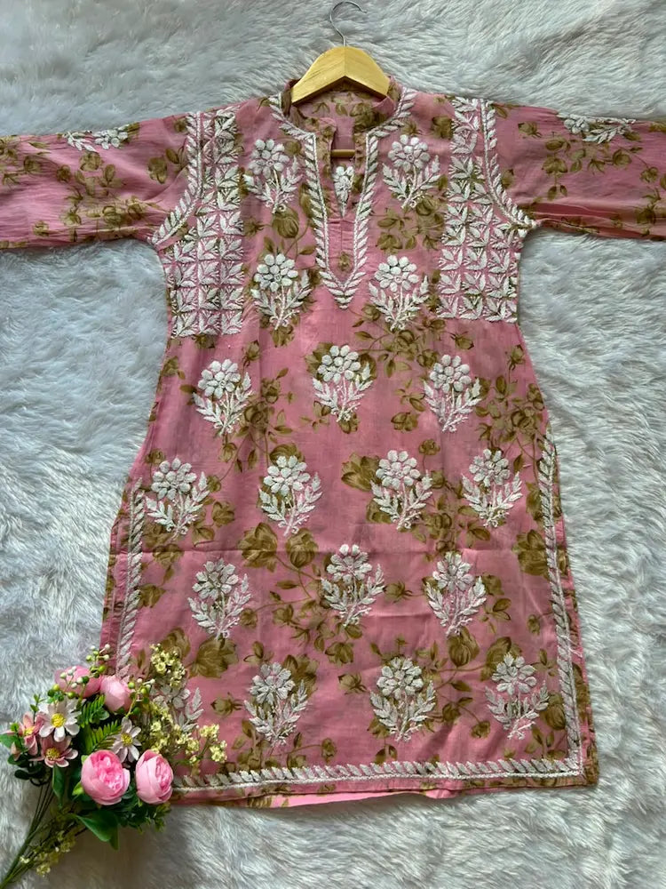 
Sana pink mul mul Lucknowi chikankari kurta set featuring delicate hand embroidery and soft breathable fabric for graceful everyday and festive ethnic wear by Hayat's Lucknowi.
