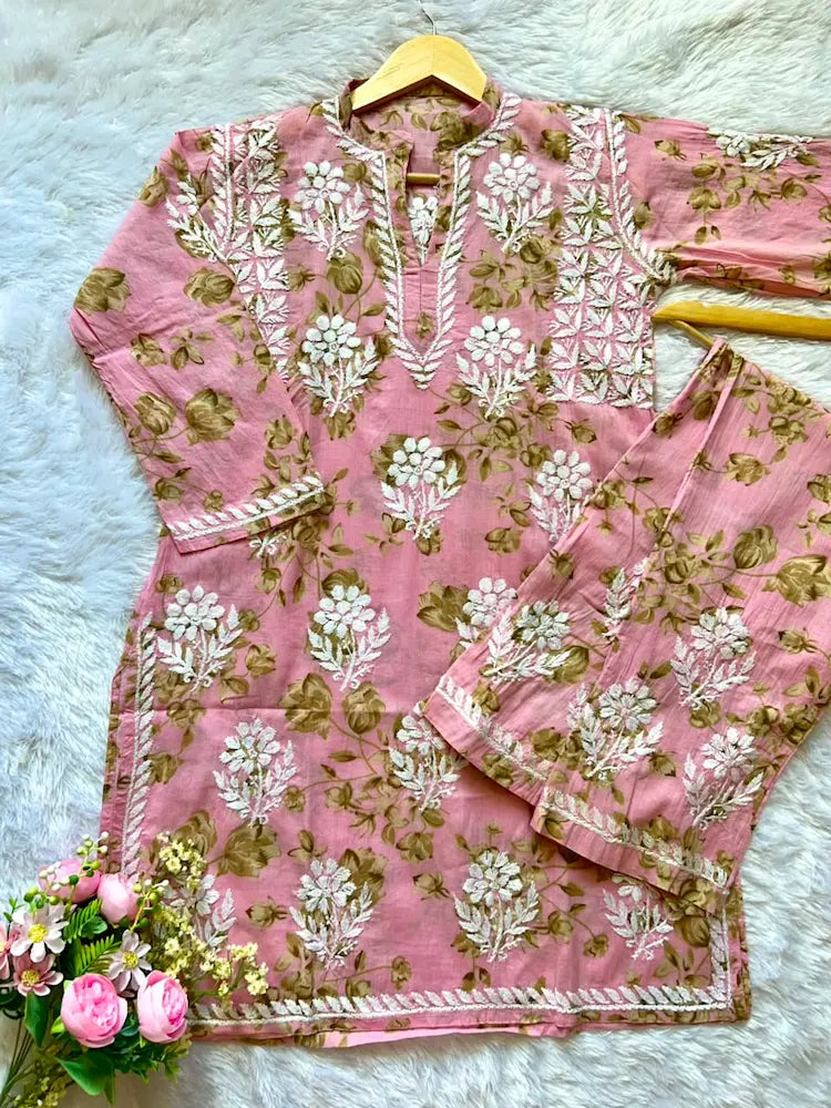 
Sana pink mul mul Lucknowi chikankari kurta set featuring delicate hand embroidery and soft breathable fabric for graceful everyday and festive ethnic wear by Hayat's Lucknowi.
