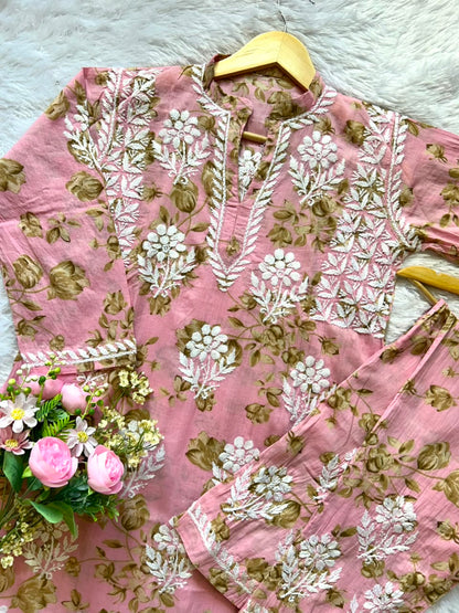 
Sana pink mul mul Lucknowi chikankari kurta set featuring delicate hand embroidery and soft breathable fabric for graceful everyday and festive ethnic wear by Hayat's Lucknowi.
