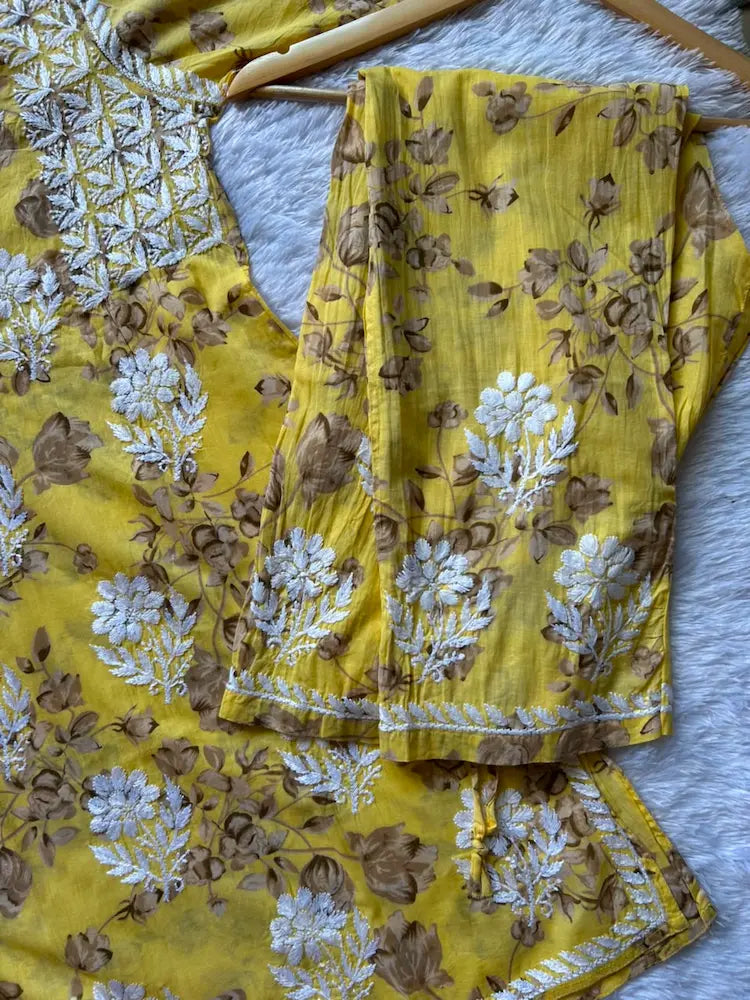 
Sana yellow mul mul Lucknowi chikankari kurta set featuring delicate hand embroidery and soft breathable fabric for bright, elegant everyday and festive ethnic wear by Hayat's Lucknowi.
