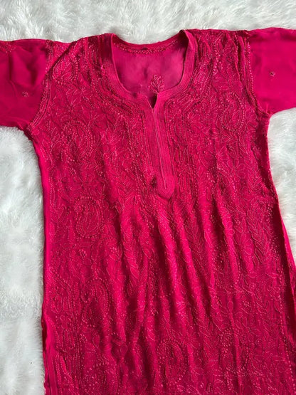 Sheeza pink viscose georgette Lucknowi Chikankari kurta set featuring intricate handcrafted Chikankari embroidery on lightweight, flowy viscose georgette fabric for elegant festive and ethnic wear by Hayat's Lucknowi.
