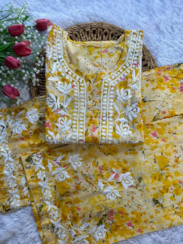 Yellow mul mul kurta set with printed chikankari embroidery by Hayat’s Lucknowi