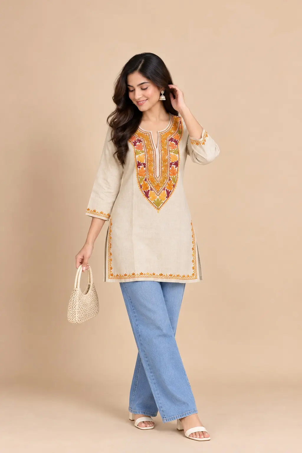 Sona Light Beige Cotton Kashmiri Short Embroidered Kurti featuring intricate traditional Kashmiri embroidery on soft, breathable cotton fabric for an elegant everyday ethnic look by Hayat’s Lucknowi.
