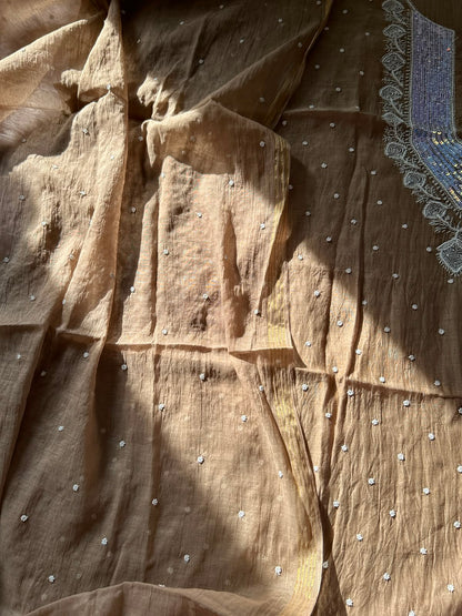 
Tabish women's brown mul Chanderi handwork kurta and dupatta unstitched suit featuring intricate handcrafted detailing and elegant traditional craftsmanship for timeless ethnic wear by Hayat's Lucknowi.
